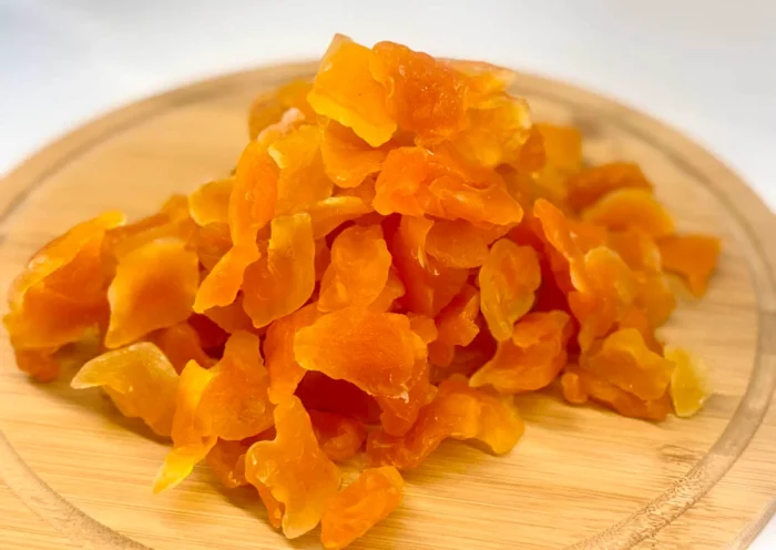 Rodajas de melón sin azúcar deshidratado, presentado en un elegante envase de Sabur Turco.